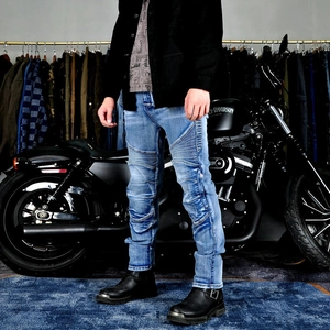 Men's retro motorcycle jeans in light blue washed denim with ribbed accordion panels