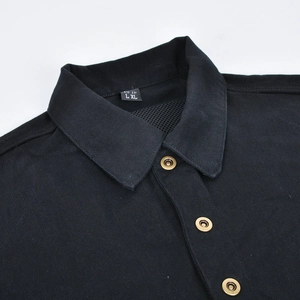 Detail of motorcycle jacket collar with mesh lining and vintage brass snap buttons