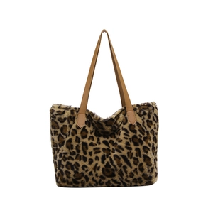Chic leopard print plush faux fur tote bag with long brown leather shoulder straps