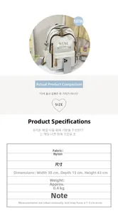 Detail view of cream nylon backpack featuring brand printing and product dimensions