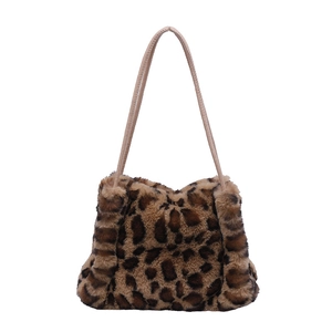 Chic leopard print plush tote bag with soft faux fur and slim brown shoulder straps