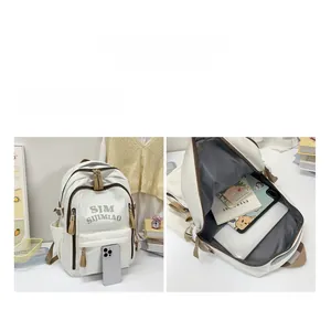 Detailed view of spacious beige backpack with internal compartments for tablet and books