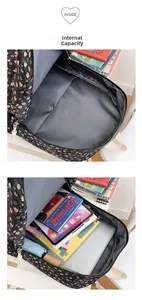 Large capacity view of floral backpack interior with tablet and books storage space