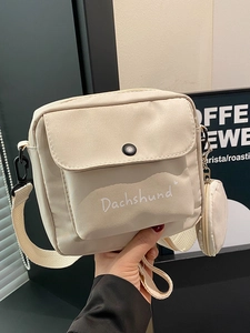 Minimalist beige canvas crossbody bag with mini coin purse and Dachshund print