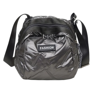 Metallic silver puffer crossbody bag with quilted nylon finish and adjustable strap