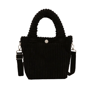 Black corduroy tote bag with ruffled handles and adjustable strap for women
