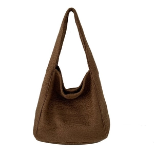 Vintage bruine faux shearling draagtas voor dames met minimalistisch schouderbandontwerp