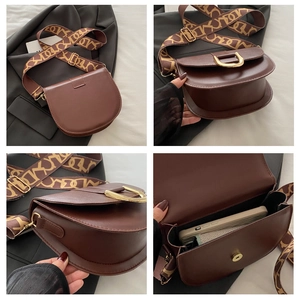 Detailed views of a dark brown saddle bag with a wide jacquard strap and gold D-ring buckle