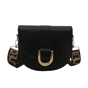 Classic black saddle crossbody bag with gold U-shaped buckle and patterned strap