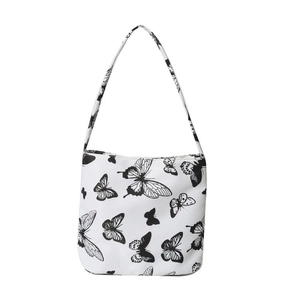 Minimalistische weiße Tragetasche mit schwarzem Schmetterlingsdruck und Trägern