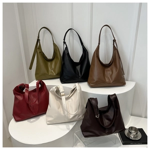 Multi-color set of slouchy hobo shoulder bags in soft faux leather with adjustable straps