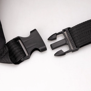 Close-up of black plastic side release buckle with durable nylon webbing strap