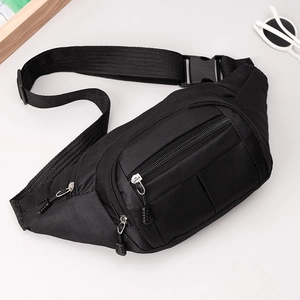 Detail of durable black multi-zipper waist bag with adjustable strap and buckle closure
