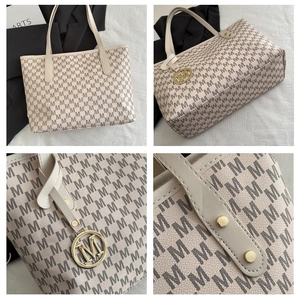 Detailed views of beige tote bag with M-pattern print and gold logo pendant