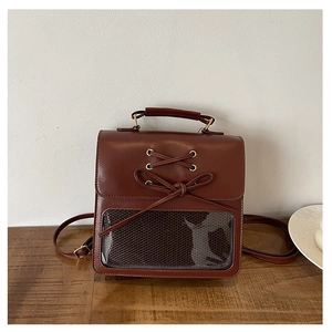 Brown vintage faux leather backpack with lace-up bow and clear display window