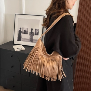Vintage brown suede fringe hobo bag with bohemian tassel design for daily shoulder use