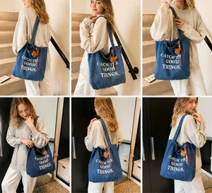 Detail of denim tote bag with letter print and teddy bear charm shown in lifestyle shots