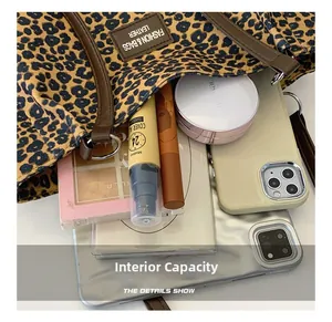 Top view of leopard print tote bag interior showing large capacity for cosmetics