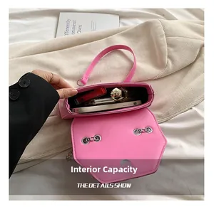 Interior view of bright pink crossbody bag showing spacious capacity for daily essentials