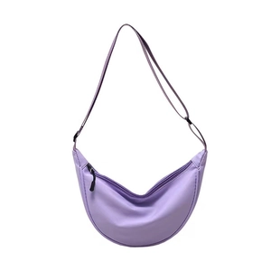 Purple nylon half-moon crossbody bag with adjustable strap and zip closure on white background