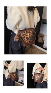 Detailed views of leopard print bucket bag with gold clasp and plush charm accessory