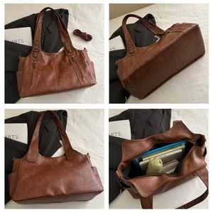 Detalle del bolso tote vintage marrón que muestra el espacio interior y el cuero PU suave