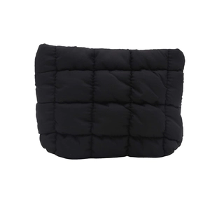 Minimalist black quilted cosmetic bag with lightweight padded nylon and square stitching