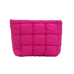 Vibrant rose red quilted clutch and makeup bag with square stitching on nylon fabric