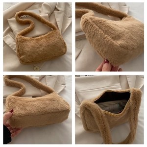 Detail view of camel plush shoulder bag showing fluffy texture and zipper closure
