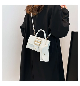 Detail of white litchi pattern square bag with mini coin purse and gold metal buckle