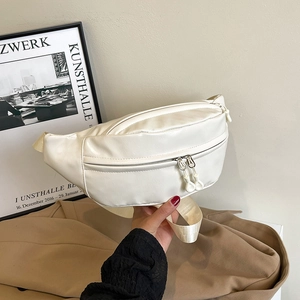 Minimalist white PU leather crossbody fanny pack with adjustable strap and dual zippers