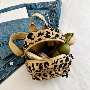 Interior view of leopard print corduroy mini backpack showing capacity for daily essentials