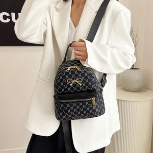 Chic black and grey geometric print mini backpack with golden bow hardware buckle