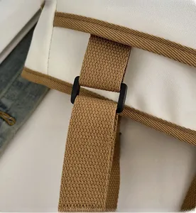 Detail of premium square adjustment buckle on minimalist canvas tote bag shoulder strap