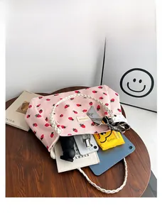 Top view of pink corduroy strawberry tote bag showing large capacity for umbrella and tablet
