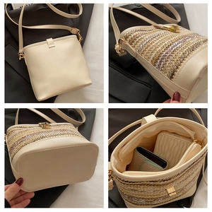 Detail view of woven PU leather bucket bag showing internal capacity and metal clasp