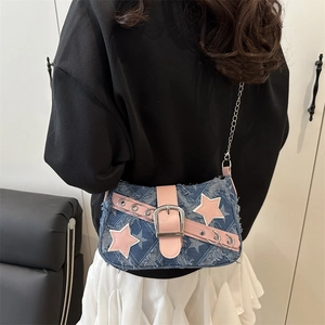Star patchwork denim shoulder bag with pink leather trim and silver chain strap