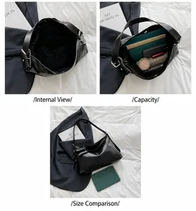 Detalle de gran capacidad del bolso tote negro brillante con iPad y varios accesorios