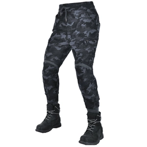Detail of men's camo motorcycle cargo pants with flap pockets and reinforced knees