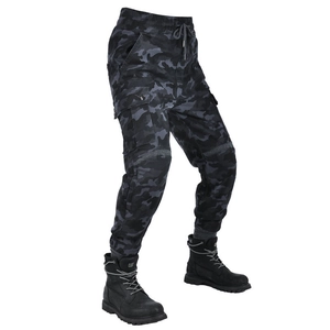 Detailed side view of camo motorcycle riding pants with cargo pockets and ribbed cuffs