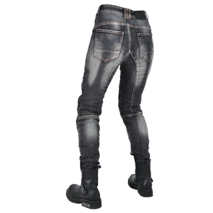 Detail of grey motorcycle jeans featuring accordion stretch panels for riding flexibility