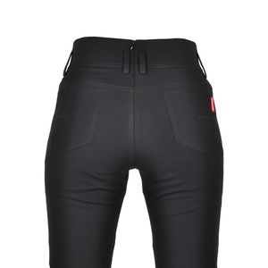 Detailed back view of high-waist motorcycle jeans with red label and reinforced stitching