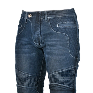 Detail of motorcycle jeans showing accordion stretch panels and reinforced quilting
