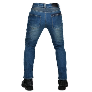 Detail of motorcycle jeans featuring accordion stretch panels and a zipped back pocket