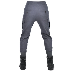 Detail view of motorcycle cargo pants with elastic waist and ribbed cuffs on the back