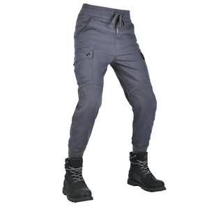 Detail of dark grey cargo motorcycle pants with side pockets and black tactical boots