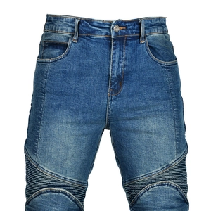 Close-up of biker ribbing and washed denim texture on men motorcycle jeans
