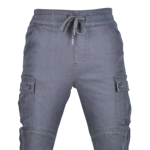 Detail of motorcycle cargo pants with elastic drawstring waist and ribbed knee stitching