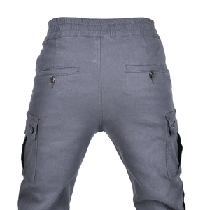 Detail view of motorcycle cargo pants featuring elastic waist and reinforced rear pockets