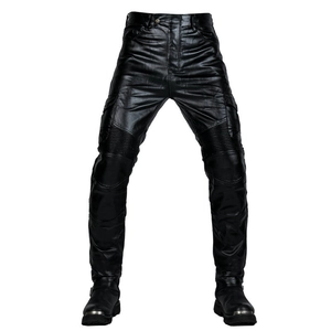 Detail of black motorcycle pants with accordion knee panels and cargo pockets on white background